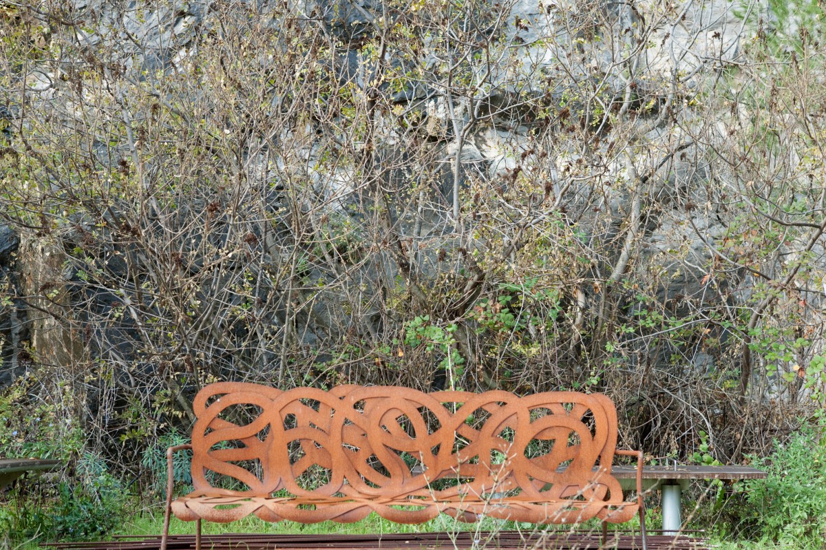 Treccia Collection, brown bench - Photograph by Rip Hopkins