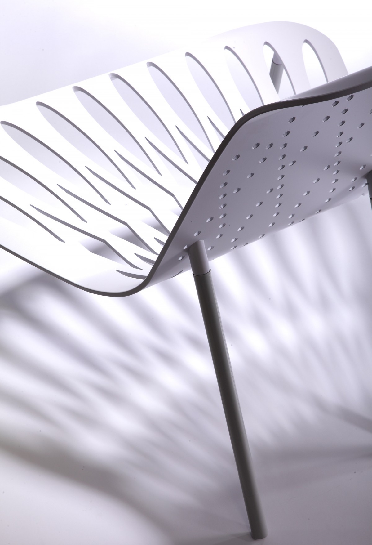 White chair detail, Nymphea Collection – Tôlerie Forézienne - Photograph by Studio Bisbee